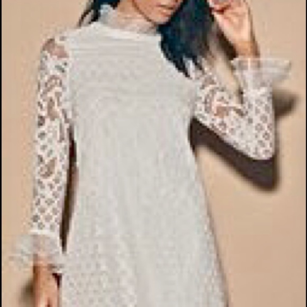 Lulus brand. Purchased on lulus. XS. White lace long sleeve shirt dress.